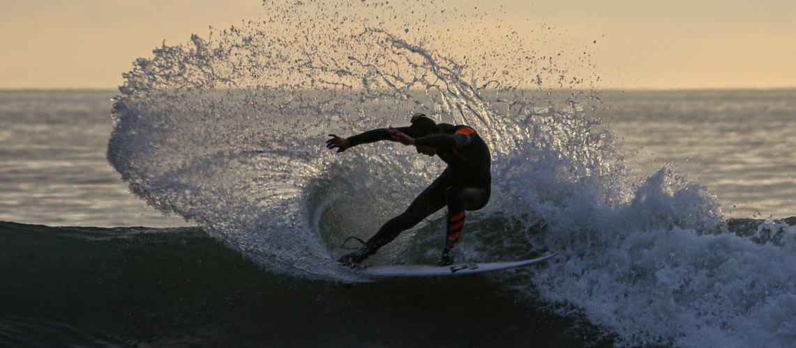 An advanced surfer practising the cutback manoeuvre on Caleta de Famara.